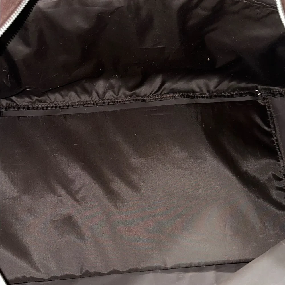 KC Sig Brown Canvas Faux Leather Silver Tone Hardware Duffel Bag with a Strap